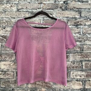 Light violet sheer top with cute crisscross twist in back excellent condition